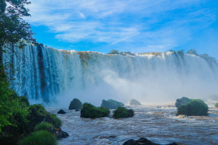 How do you get to Brazil side of Iguazu Falls?