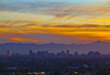 Is Phoenix surrounded by mountains? Is Phoenix surrounded by mountains?