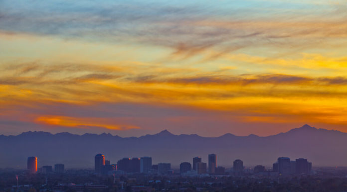 Is Phoenix surrounded by mountains? Is Phoenix surrounded by mountains?
