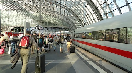 Is it better to fly or take train from Amsterdam to Paris?