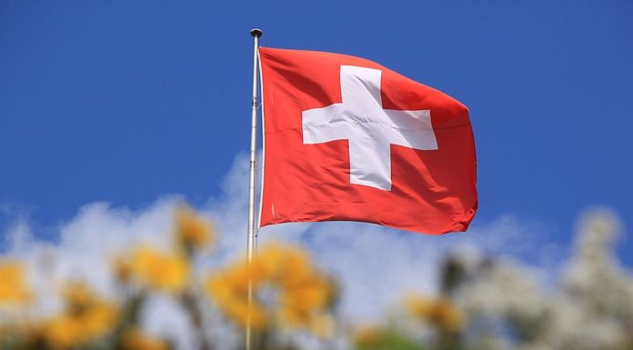 What does the Swiss cross stand for? What does the Swiss cross stand for?