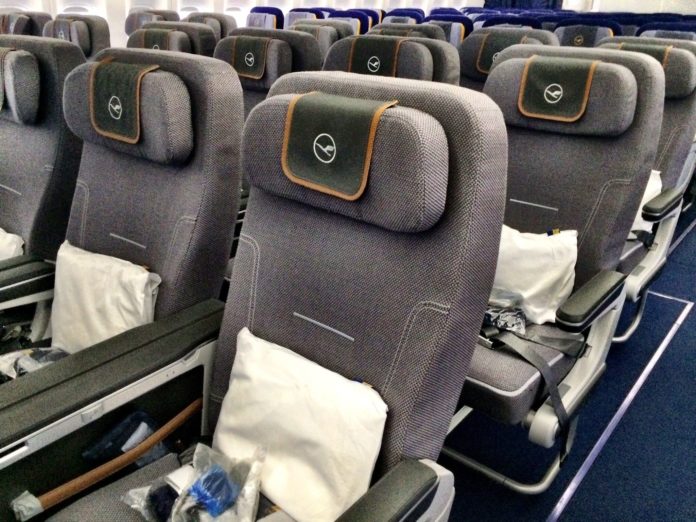 What is the difference between Economy Class and Premium Economy Class?