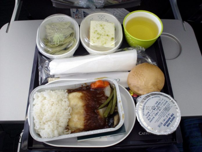 What's the difference between economy and premium economy on Cathay Pacific?